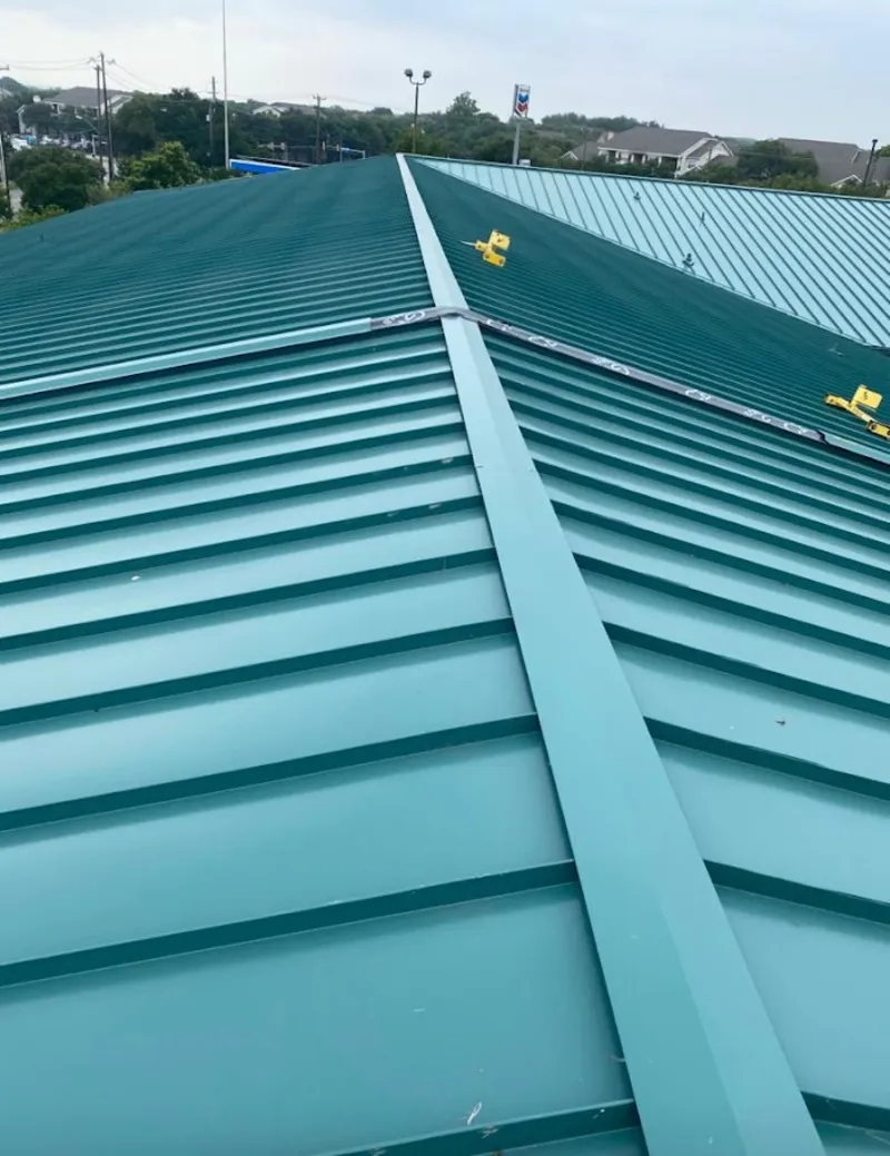 Green commercial metal roof ridge and valley for Metal Roof Repair in Barnstable Town